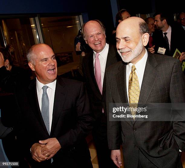 Charles Pizzi, president and chief executive officer of Tasty Baking Co., left, and Charles Plosser, president of the Philadelphia Federal Reserve...