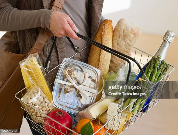 woman shopping for groceries - raw food diet stock pictures, royalty-free photos & images