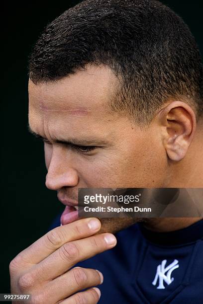 Alex Rodriguez of the New York Yankees talks with teammates as he warms up for the game with the Los Angeles Angels of Anaheim on April 23, 2010 at...