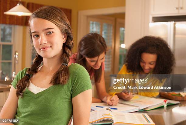 friends doing homework - mark atkinson stock pictures, royalty-free photos & images