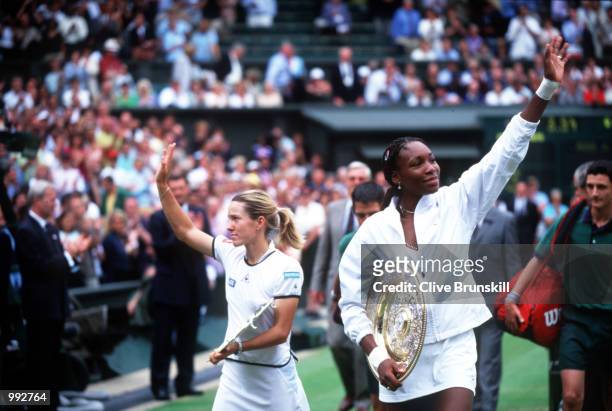 Happy Venus Williams of the USA after beating Justine Henin of Belgium during the women's final of The All England Lawn Tennis Championship at...