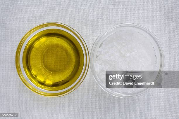 olive oil and sea salt - olive oil bowl stock pictures, royalty-free photos & images