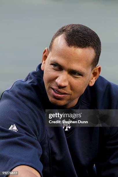 Alex Rodriguez of the New York Yankees talks with teammates as he warms up for the game with the Los Angeles Angels of Anaheim on April 23, 2010 at...