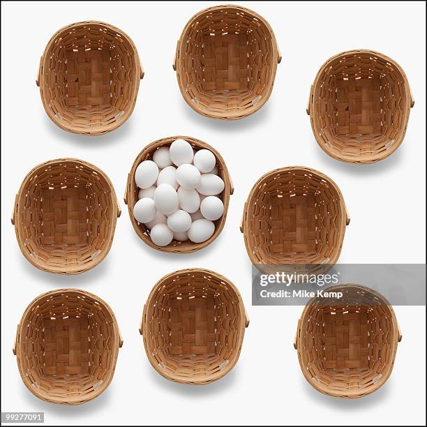 baskets and eggs - eggs in basket stock pictures, royalty-free photos & images