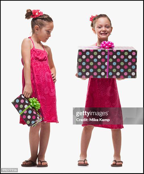 jealousy among twin sisters - jealous sister stock pictures, royalty-free photos & images