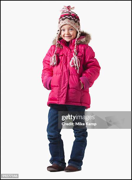 young girl wearing winter clothing - kid in winter coat stock pictures, royalty-free photos & images