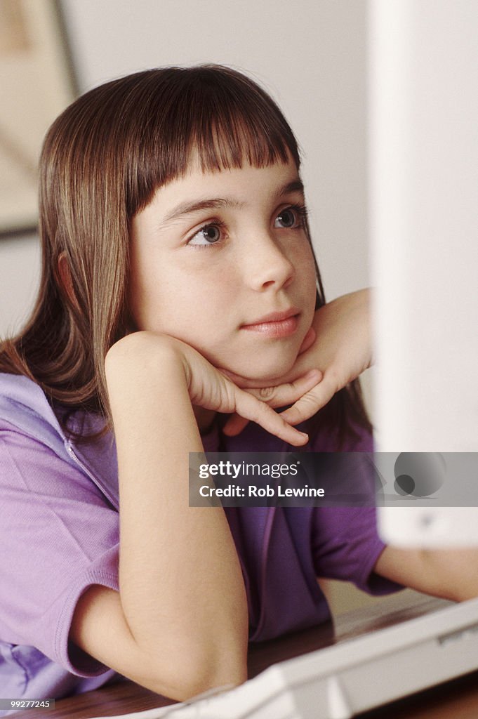 Child looking at computer