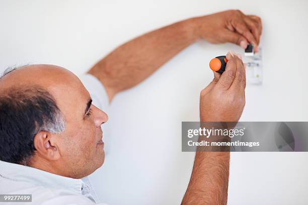 handyman - handyman smiling stock pictures, royalty-free photos & images