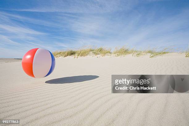 beach ball - balls bouncing stock pictures, royalty-free photos & images