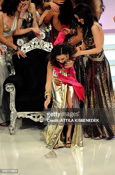 Newly-elected Miss World Hungary 2010, 22-year-old university student Agnes Dobo picks up her victory crown after she won the title for the Miss...