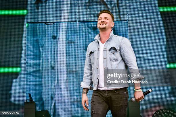 German singer Ben Zucker performs live during the show 'Die Schlagernacht des Jahres' at the Waldbuehne on June 16, 2018 in Berlin, Germany.