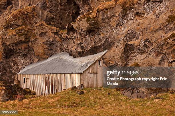 house overcome by lava flow. - south central iceland stock pictures, royalty-free photos & images