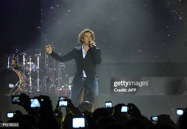 Spanish singer David Bisbal performs during a concert in Montevideo, Uruguay, on May 12, 2010. AFP PHOTO/Mariana SUAREZ