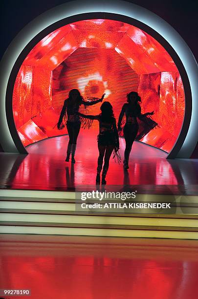 Participants of the Miss World Hungary 2010 beauty contest dance on the stage in Budapest late on May 13, 2010 during the final of a joint beauty...