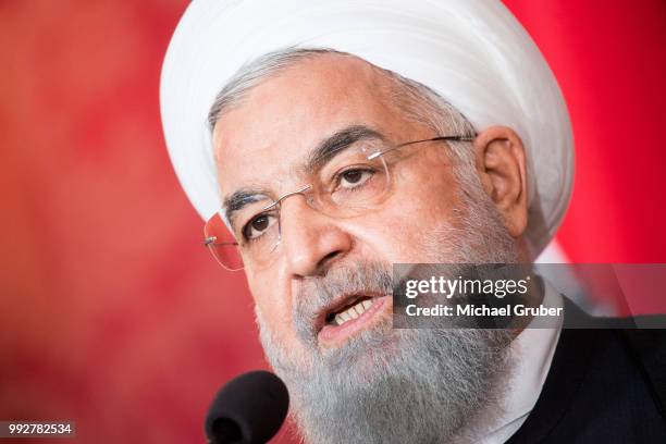 Austrian President Alexander van der Bellen and Iranian President Hassan Rouhani give a joint press statement at Hofburg Palace on July 4, 2018 in...