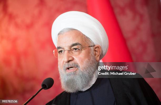 Austrian President Alexander van der Bellen and Iranian President Hassan Rouhani give a joint press statement at Hofburg Palace on July 4, 2018 in...