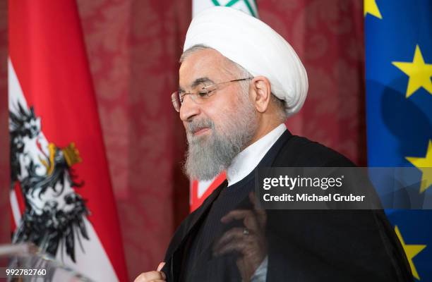Austrian President Alexander van der Bellen and Iranian President Hassan Rouhani give a joint press statement at Hofburg Palace on July 4, 2018 in...