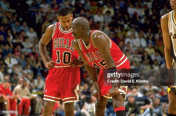 Chicago Bulls Michael Jordan talking to teammate B.J. Armstrong on court during game vs Indiana Pacers. Indianapolis, IN 3/19/1995 CREDIT: David E....