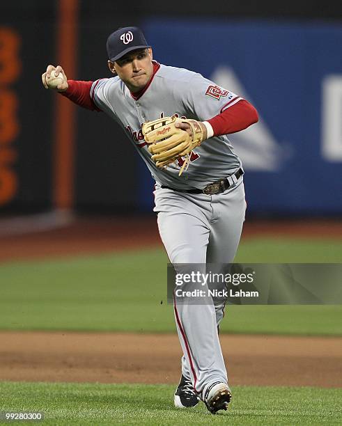 Ryan Zimmerman of the Washington Nationals throws to first against the New York Mets at Citi Field on May 11, 2010 in the Flushing neighborhood of...