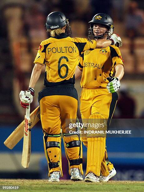 Australian cricketer leah Poulton celebrates with her teammate Jess Cameron after defeating India at the end of the ICC Women�s World Cup Twenty20...