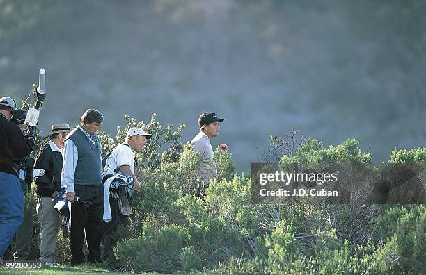 Buick Invitational: PGA Tour rules official Mark Russell, Frank Lickliter 's caddie, and Phil Mickelson searching for ball in rough after Mickelson's...