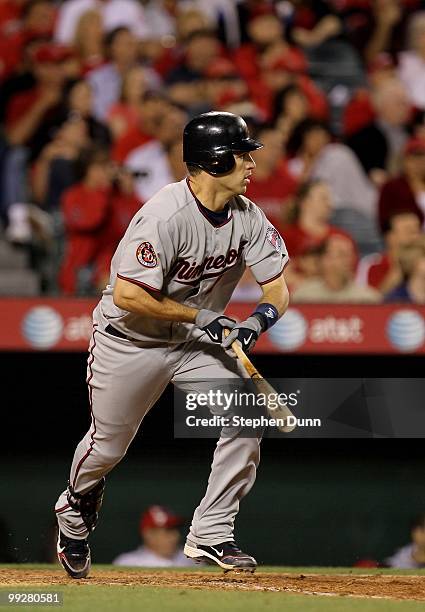 Joe Mauer of the Minnesota Twins bats against the Los Angeles Angels of Anaheim on April 8, 2010 at Angel Stadium in Anaheim, California. The Twins...