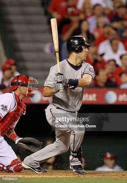 Joe Mauer of the Minnesota Twins bats against the Los Angeles Angels of Anaheim on April 8, 2010 at Angel Stadium in Anaheim, California. The Twins...