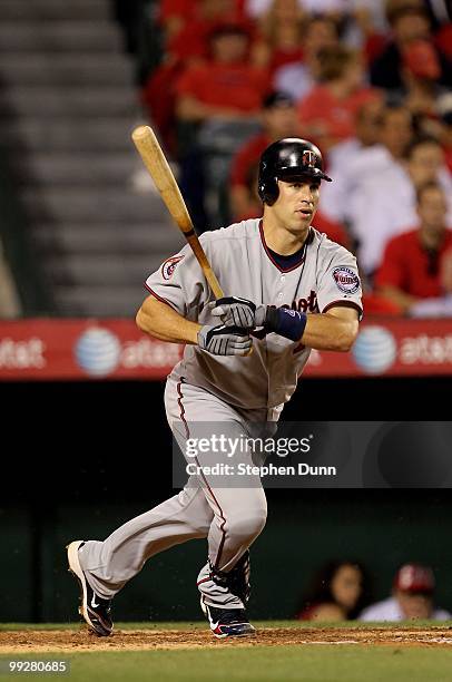 Joe Mauer of the Minnesota Twins bats against the Los Angeles Angels of Anaheim on April 8, 2010 at Angel Stadium in Anaheim, California. The Twins...