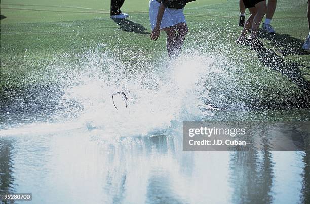 Nabisco Championship: Annika Sorenstam victorious, jumping into Champions Pond after winning tournament on Sunday at Mission Hills CC. Rancho Mirage,...