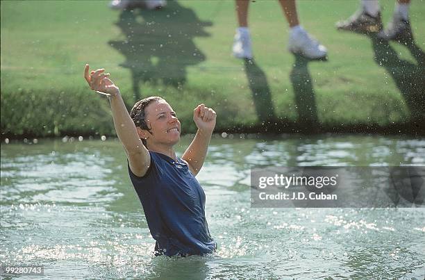 Nabisco Championship: Annika Sorenstam victorious, jumping into Champions Pond after winning tournament on Sunday at Mission Hills CC. Rancho Mirage,...
