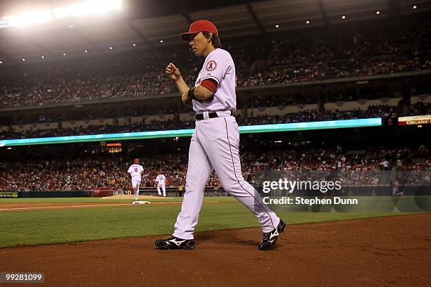 Hideki Matsui of the Los Angeles Angels of Anaheim walks to his position in left field against the Minnesota Twins on April 8, 2010 at Angel Stadium...