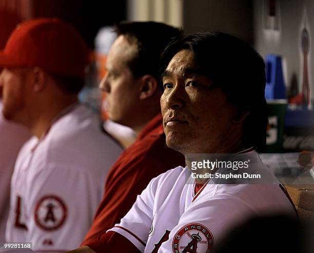 Hideki Matsui of the Los Angeles Angels of Anaheim sits on the bench during the game against the Minnesota Twins on April 8, 2010 at Angel Stadium in...
