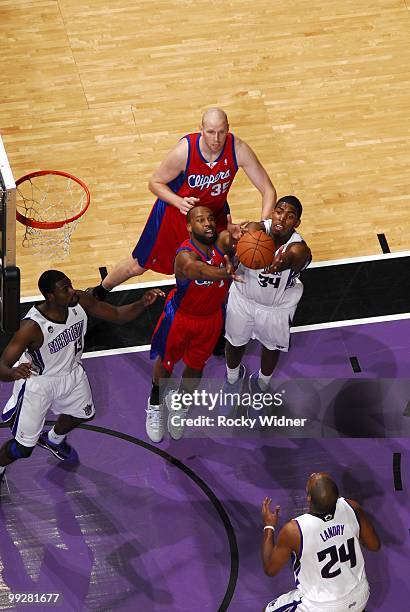 Jason Thompson of the Sacramento Kings rebounds against Baron Davis of the Los Angeles Clippers during the game at Arco Arena on April 8, 2010 in...