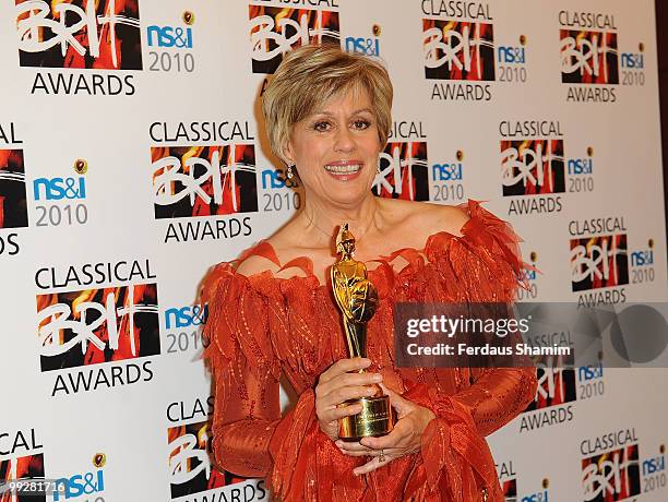 Dame Kiri Te Kanawa poses with the Lifetime Achivement award in the winners room at the Classical BRIT Awards at Royal Albert Hall on May 13, 2010 in...