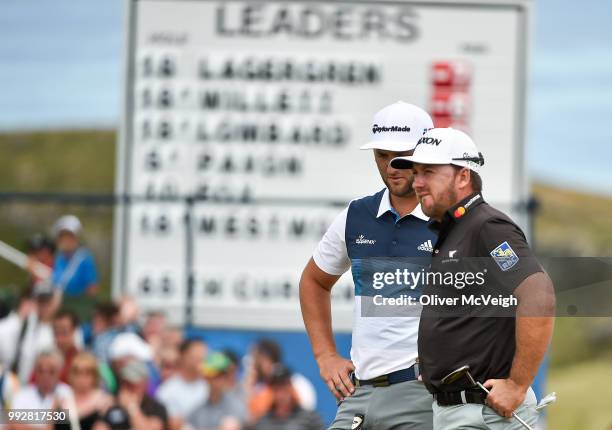 Donegal , Ireland - 6 July 2018; Jon Rahm, left, of Spain and Graeme McDowell of Northern Ireland on the 9th green during Day Two of the Dubai Duty...