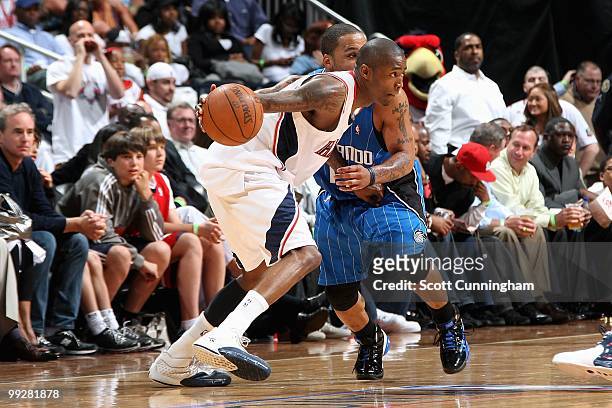 Jamal Crawford of the Atlanta Hawks drives past Jameer Nelson of the Orlando Magic in Game Four of th Eastern Conference Semifinals during the 2010...