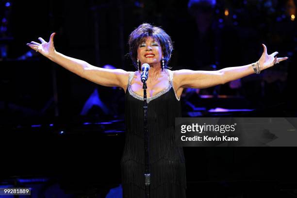 Singer Dame Shirley Bassey performs on stage during the Almay concert to celebrate the Rainforest Fund's 21st birthday at Carnegie Hall on May 13,...