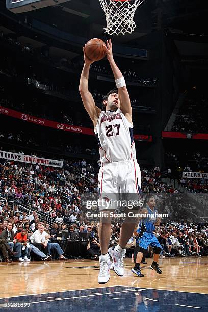 Zaza Pachulia of the Atlanta Hawks comes down with a rebound in Game Four of the Eastern Conference Semifinals against the Orlando Magic during the...