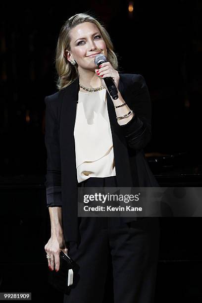 Kate Hudson speaks on stage during the Almay concert to celebrate the Rainforest Fund's 21st birthday at Carnegie Hall on May 13, 2010 in New York...