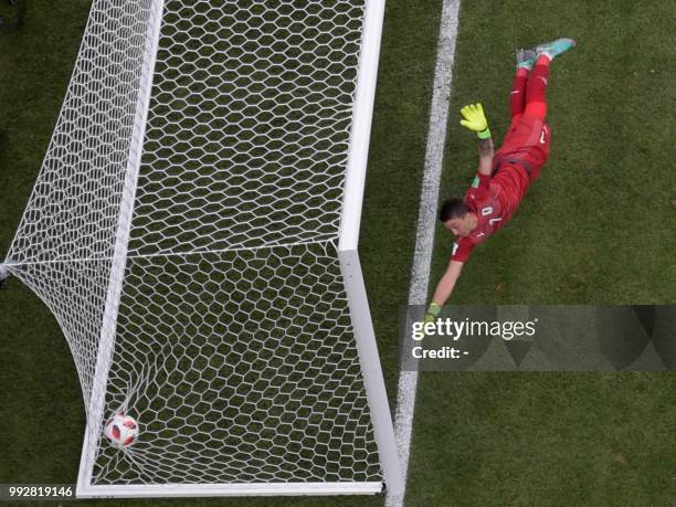 Uruguay's goalkeeper Fernando Muslera concedes a goal during the Russia 2018 World Cup quarter-final football match between Uruguay and France at the...