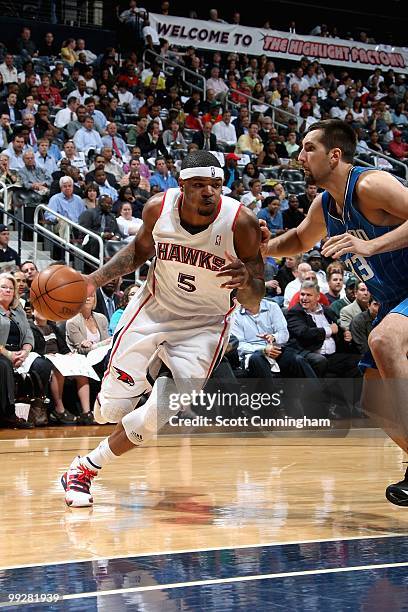 Josh Smith of the Atlanta Hawks drives to the basket past Ryan Anderson of the Orlando Magic in Game Four of th Eastern Conference Semifinals during...