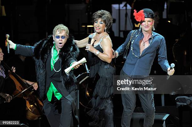 Elton John, Dame Shirley Bassey and Sting perform on stage during the Almay concert to celebrate the Rainforest Fund's 21st birthday at Carnegie Hall...
