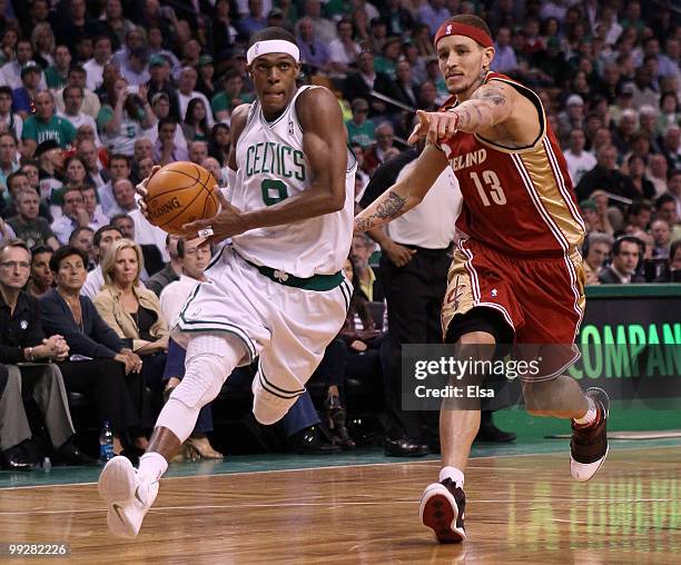 Rajon Rondo of the Boston Celtics drives to the net as Delonte West of the Cleveland Cavaliers defends during Game Six of the Eastern Conference...