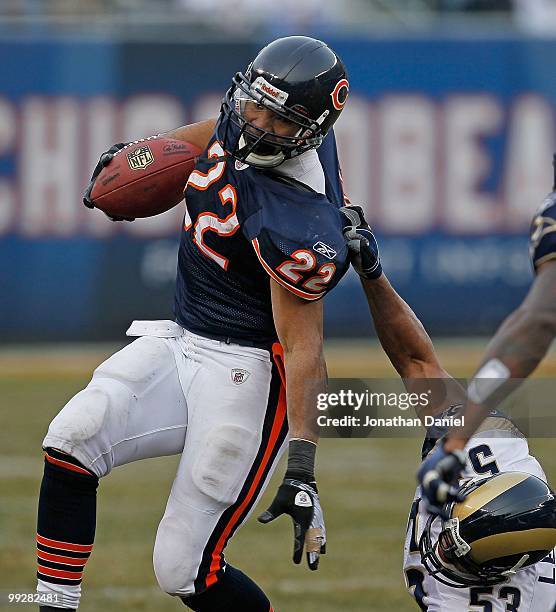 Matt Forte of the Chicago Bears is brought down by an illegal "horse-collar" tackle by Paris Lenon of the St. Louis Rams at Soldier Field on December...