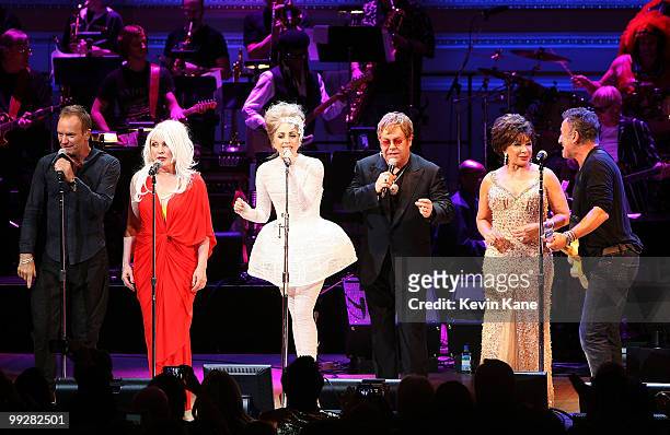 Sting, Debbie Harry, Lady Gaga, Elton John, Dame Shirley Bassey and Bruce Springsteen perform on stage during the Almay concert to celebrate the...