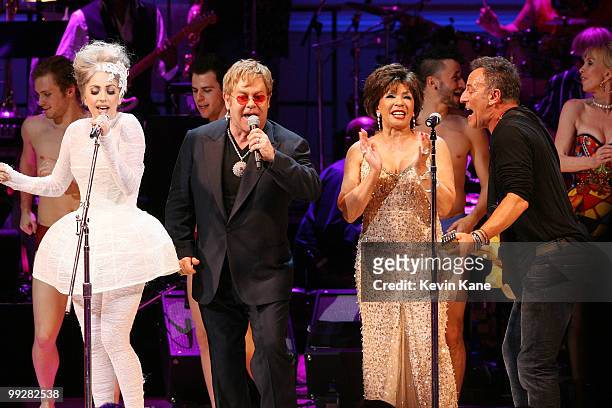 Lady Gaga, Elton John, Dame Shirley Bassey and Bruce Springsteen perform on stage during the Almay concert to celebrate the Rainforest Fund's 21st...