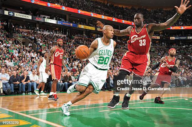 Ray Allen of the Boston Celtics drives against Shaquille O'Neal of the Cleveland Cavaliers in Game Six of the Eastern Conference Semifinals during...