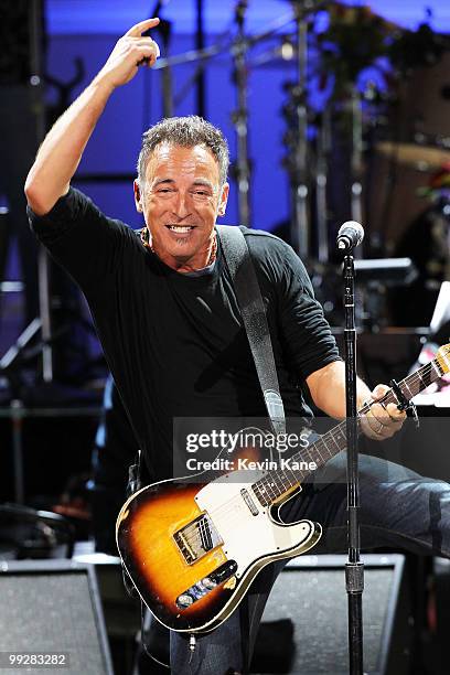 Bruce Springsteen performs on stage during the Almay concert to celebrate the Rainforest Fund's 21st birthday at Carnegie Hall on May 13, 2010 in New...