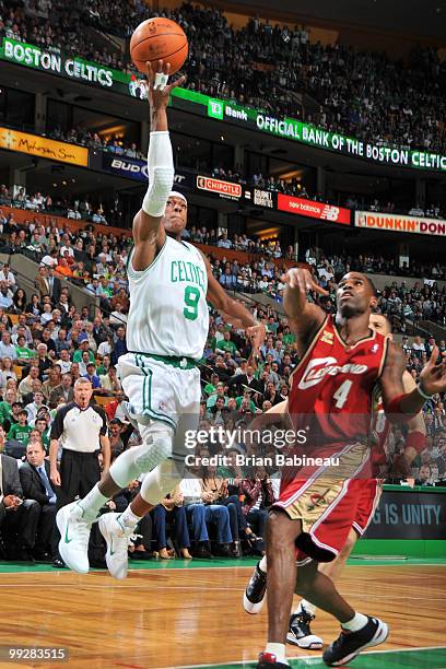 Rajon Rondo of the Boston Celtics lays the ball up in the lane against Antawn Jamison of the Cleveland Cavaliers in Game Six of the Eastern...