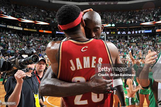 LeBron James of the Cleveland Cavaliers talks to Kevin Garnett of the Boston Celtics after the Cavaliers' loss in Game Six of the Eastern Conference...